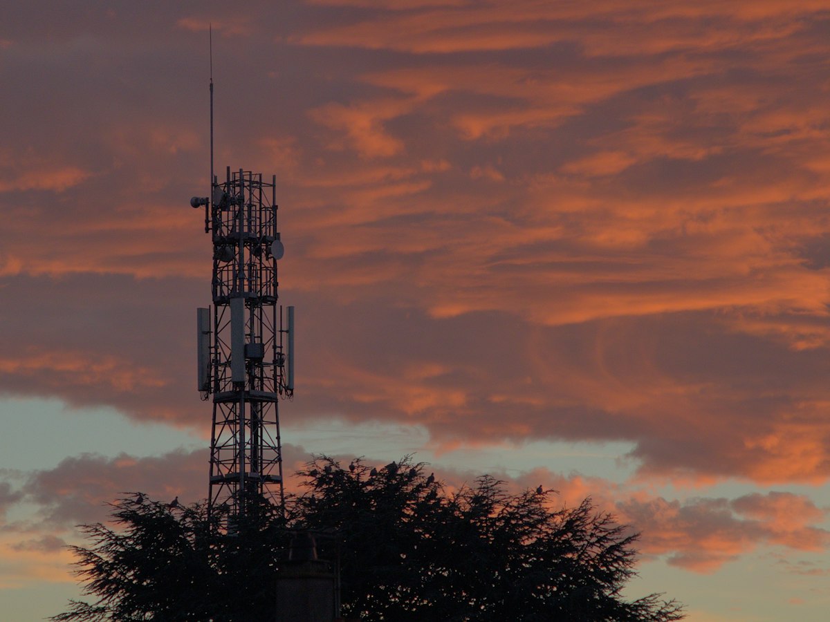 Telecommunications tower at sunset